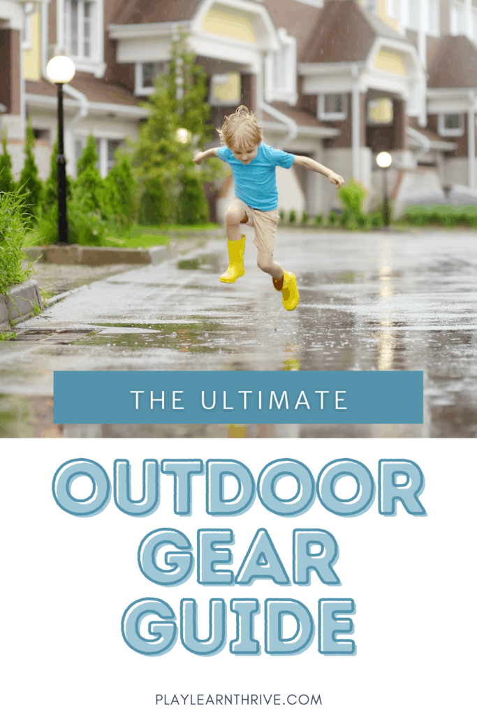 Young child wearing teal short sleeve shirt, khaki shorts and bright yellow rain boots stomping in a rain puddle. Text reads The Ultimate Outdoor Gear Guide.